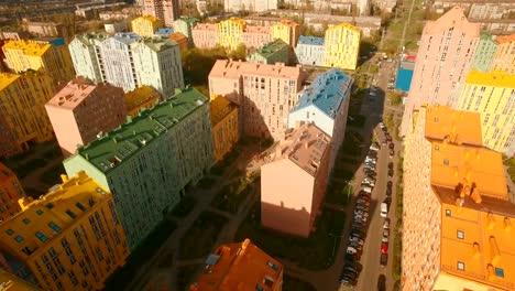 Flying-over-cozy-comfortable-colorful-buildings-in-a-European-city-4K-UHD-aerial