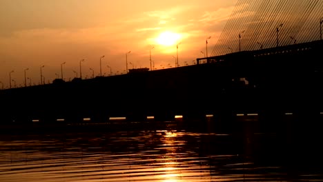 River-and-bridge.Most-at-sunset