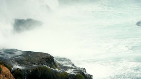 the-splashes-of-the-waterfall-falling-on-rocks