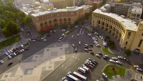 Transportation-in-Yerevan-town,-cars-driving-on-Republic-square,-traffic-rules