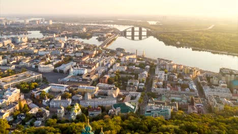 Kyiv--Kiev-,-Ukraine.-Aerial-hyperlapse-of-Kiev-old-city-center.-Flying-over-St.-Andrew's-Church-and-Podol-at-sunrise.-UHD-4K