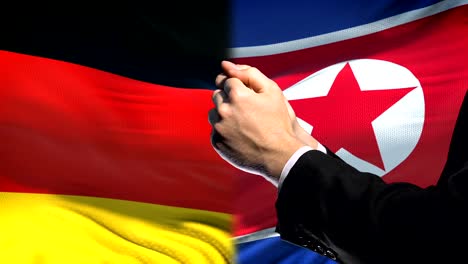 Deutschland-Sanktionen-Nordkorea,-verkettete-Arme,-politischen-oder-wirtschaftlichen-Konflikt