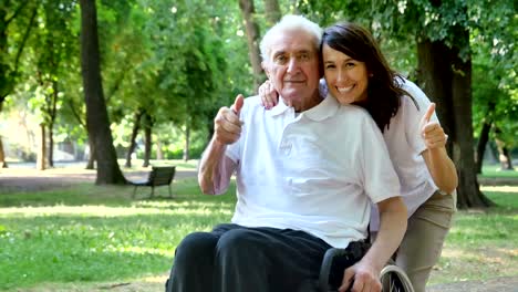 Granddaughter,-nurse,-caring-for-the-elderly,-girl-(woman),-grandfather,-happy,-freedom,-running-around-in-the-park.