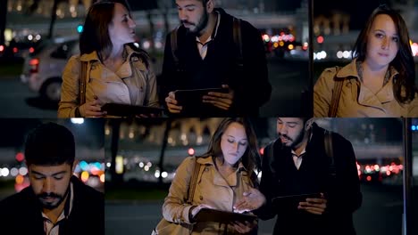 Two-colleagues-using-tablets-outdoor.