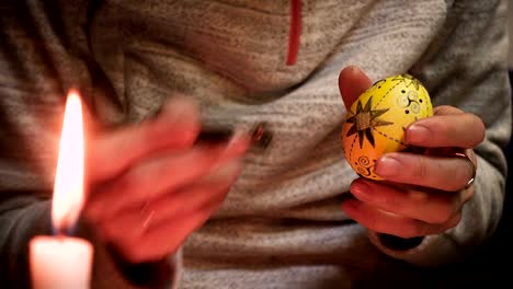 female-craftman-hands-painting-easter-egg-traditonal-folk-process-creating-layer-by-layer-with-the-wax-and-using-multicolored-paints-close-up