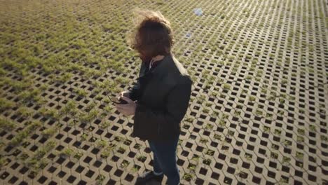 Young-Trendy-Man-with-Smartphone-Outdoors