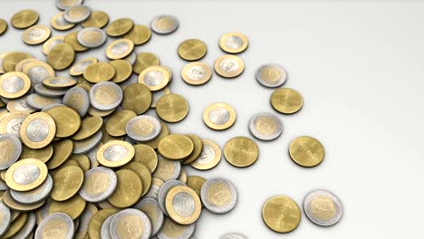 Saudi-coins-falling-down-on-a-surface