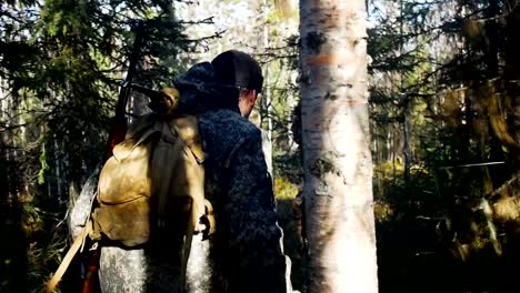 Man-hunter-outdoor-in-forest-hunting-alone