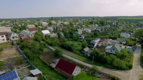 aerial-rural-houses-with-solar-panels-on-a-roof