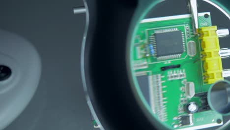 4K:-Dolly-Shot-Magnified-View-over-Circuit-Board