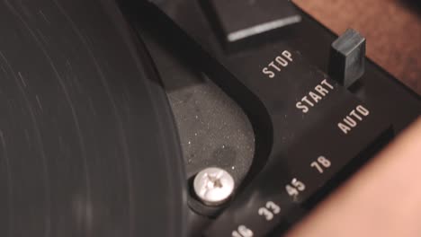 Closeup-Auto-Start-Record-Player-Needle-and-Vinyl