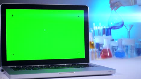 Laptop-with-a-Green-Screen-in-the-Laboratory