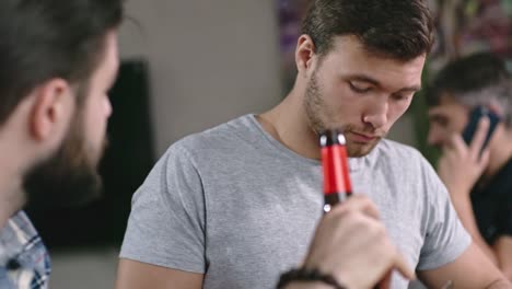 Man-Cutting-Vegetables-at-Party