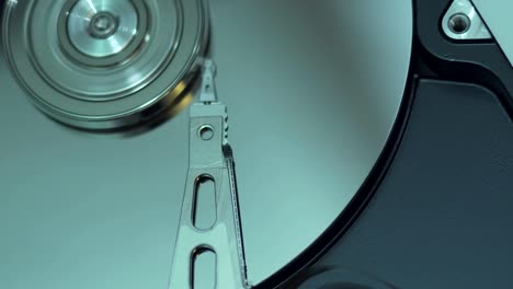 Operating-hard-disk-drive-on-dark-background.