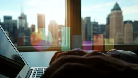 Business-Man-Using-Computer-with-Charts,-Diagrams,-Graphs-and-Figures.-Typing-on-Keyboard-of-Laptop.-Cityscape-in-the-Background.