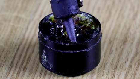 soldering-iron-in-rosin-close-up