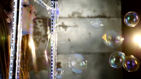 A-woman-blows-bubbles-through-the-frame