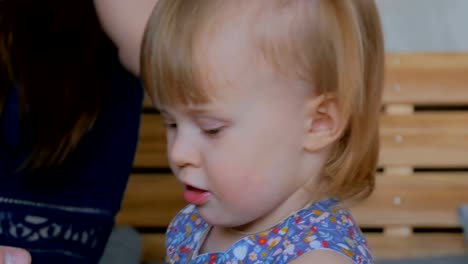 Portrait-of-funny-little-girl-at-home