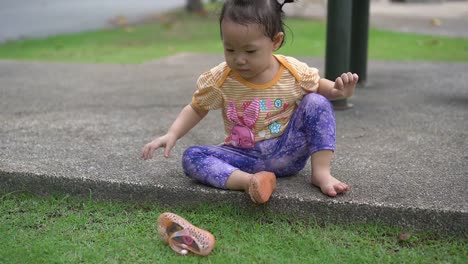 little-girl-with-her-shoes.