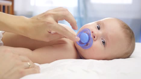 Cute-4-month-old-baby-in-blanket.-Close-up.