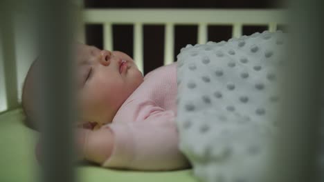 Side-View-of-Sleeping-Newborn-Baby-Dolly-Shot-Close-Up