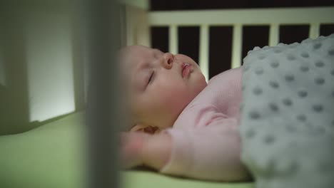 Side-View-of-Sleeping-Newborn-Baby-Dolly-Shot-Close-Up