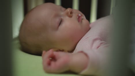 Side-View-of-Sleeping-Newborn-Baby-Dolly-Shot-Close-Up