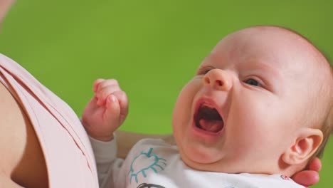 Baby-in-Mothers-Arms-Falling-Asleep