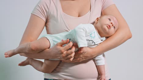 Beautiful-Baby-in-her-Mothers-Arms