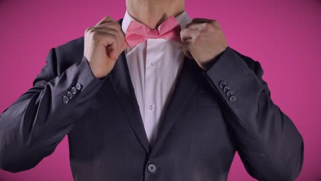 Pink-Bowtie,-Man-in-Black-Tuxedo-Suit,-Hands,-Elegant-Wedding-Fashion