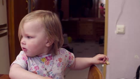 Little-baby-girl-eating-cookies