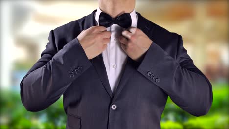 Groom-Elegant-Man-Tuxedo-Black-Bow-Tie,-Destination-Wedding,-Happy-Lifestyle