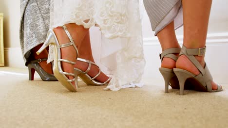 Bride-and-bridesmaids-show-off-their-shoes-4K-4k