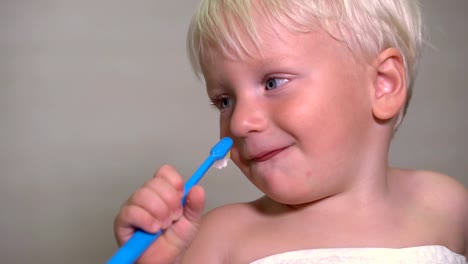 a-two-year-boy-brushing-his-teeth-before-going-to-bed