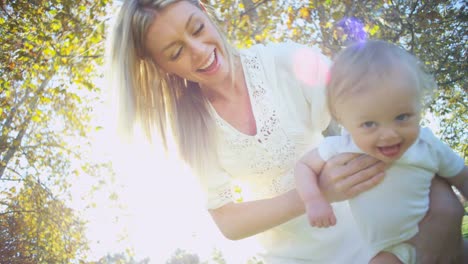 Portrait-of-mother-having-fun-with-baby-son