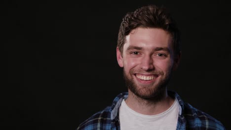 Man's-Face-Against-a-Black-Background