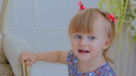 Portrait-of-funny-little-girl-at-home