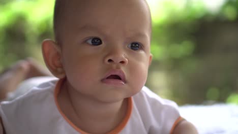 Happy-portrait-baby-boy-playing-alone