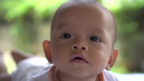 Happy-portrait-baby-boy-playing-alone