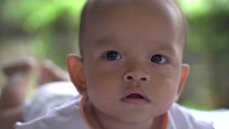 Happy-portrait-baby-boy-playing-alone