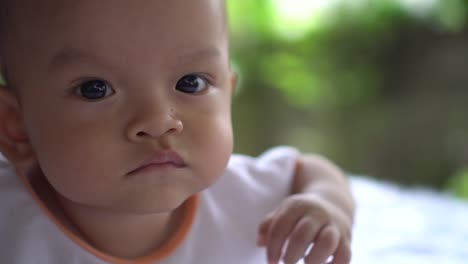 Happy-portrait-baby-boy-playing-alone