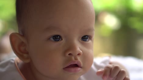 Happy-portrait-baby-boy-playing-alone