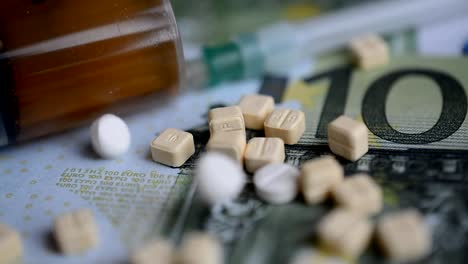 Drugs-pellets-EUR-money