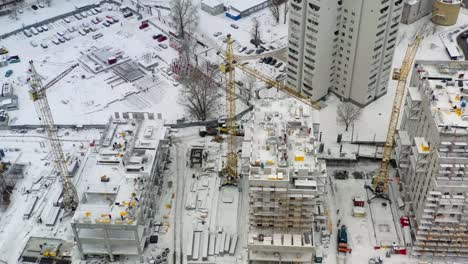 Aerial-view-of-building-construction-site-in-winter