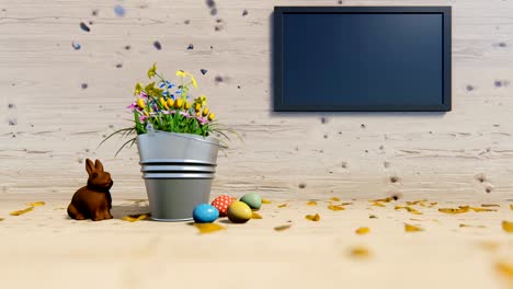 Easter-eggs-and-chocolate-rabbit-near-a-flower-bucket-and-flat-screen-tv