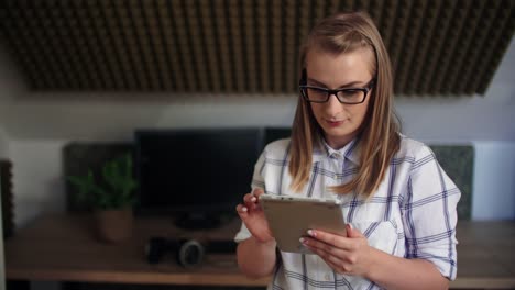 Pretty-Executive-With-Digital-Tablet-At-Office