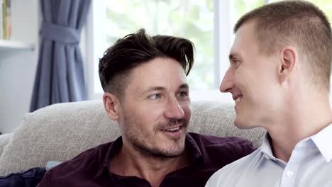 Gay-couple-relaxing-on-couch.-Close-up-shot.