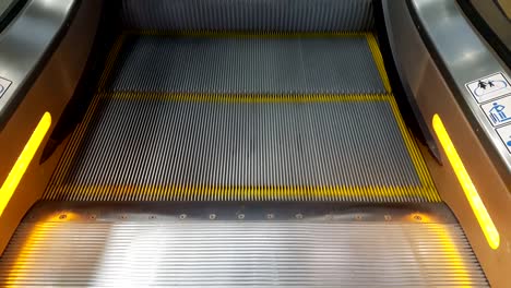 Moving-escalator-steps.-Escalator-in-work.