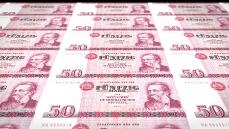 Billetes-de-50-marcos-alemanes-o-marcos-alemanes-del-Banco-de-la-República-alemana-viejo-rodando-en-la-pantalla,-las-monedas-del-mundo,-dinero-en-efectivo,-lazo