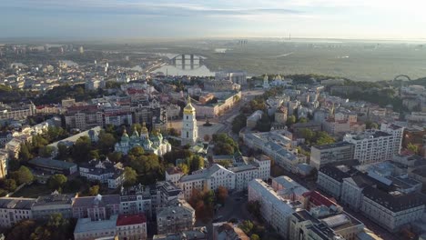 Kiev-city-center-in-morning-lights.-Dnipro-river-and-Sophia-Cathedral-of-Kiev,-Ukraine.-Aerial-drone-shot.-4K,-UHD